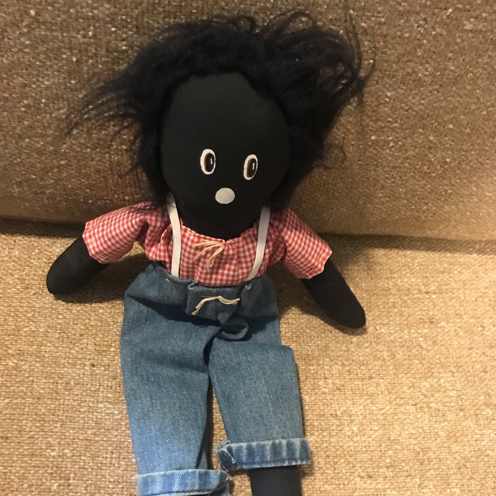 Hand made cloth doll .